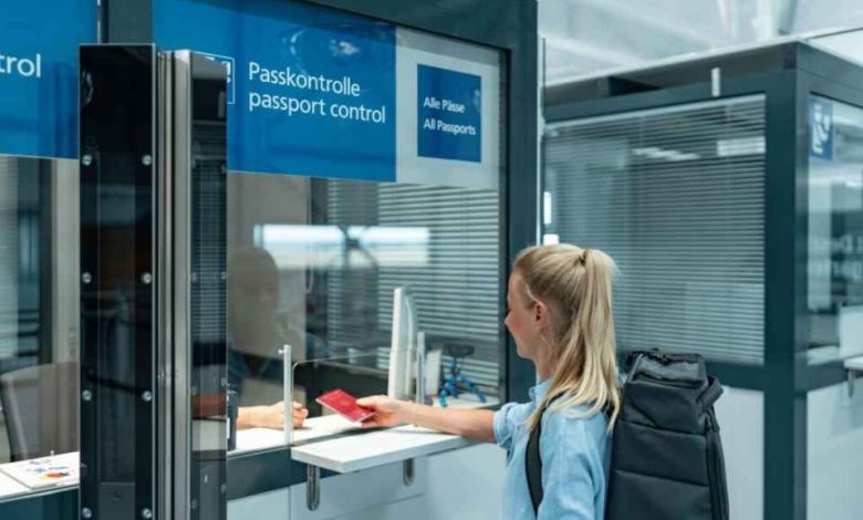 woman backpack passport control airport 1